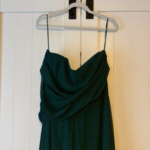 This is a Birdy Grey Kira one-shoulder bridesmaid dress in emerald chiffon
